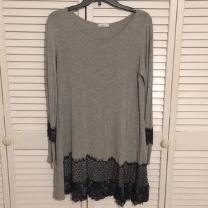 Ladies long sleeve dress with lace front hem